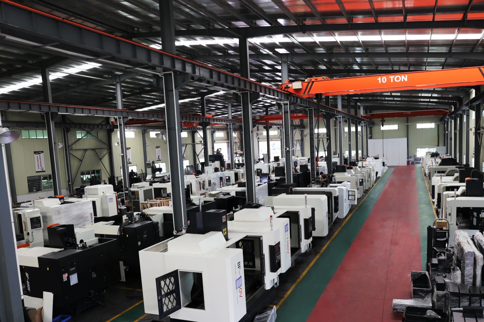 Row of Baofeng CNC vertical machining centres on the assembly line in the Guangzhou factory.
